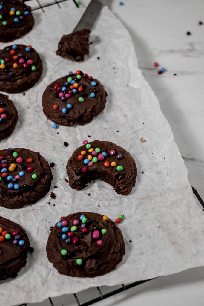 Homemade cosmic brownie cookies bite shot side view