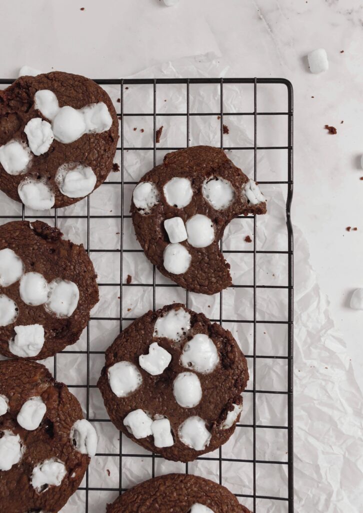 Homemade hot cocoa cookies bite shot top view