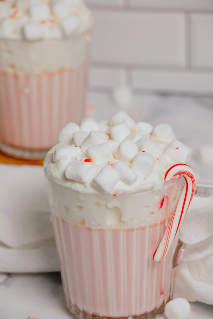 Homemade pink peppermint hot cocoa close up detail shot side view