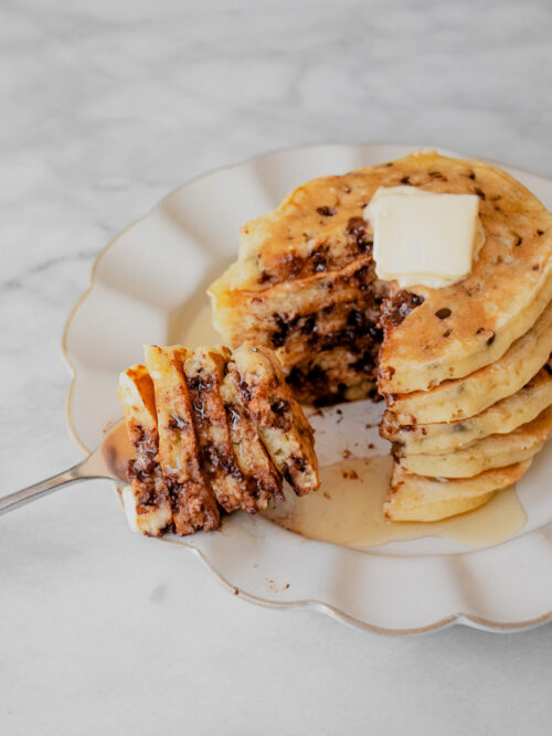 stack of chocolate chip pancakes sliced