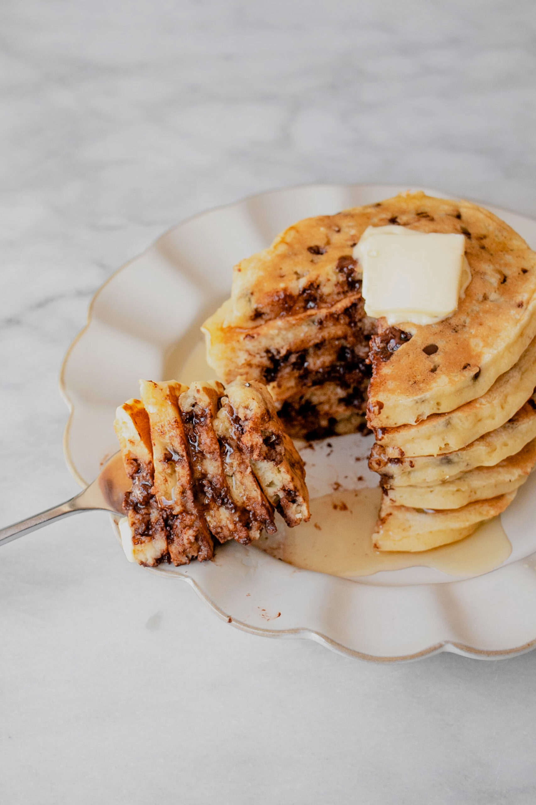 stack of chocolate chip pancakes sliced