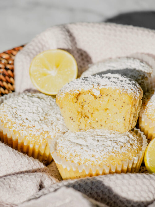 homemade lemon poppy seed muffins with a bite