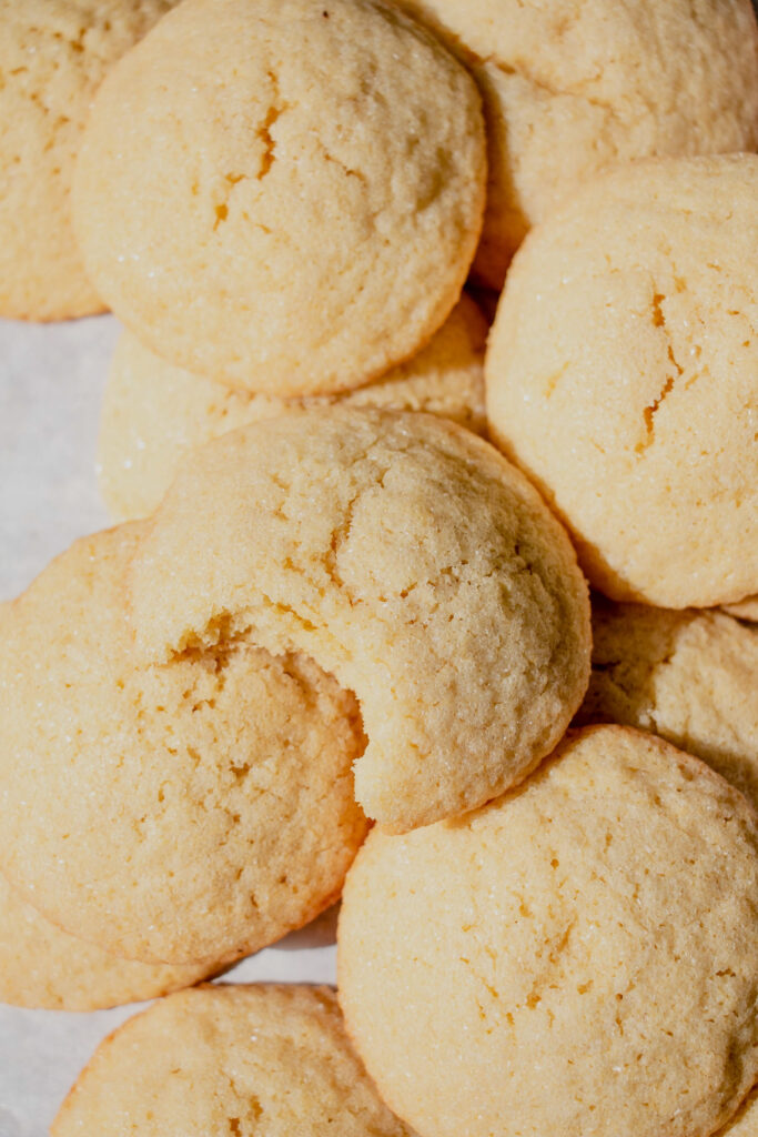 homemade sugar cookies piled on top of each other