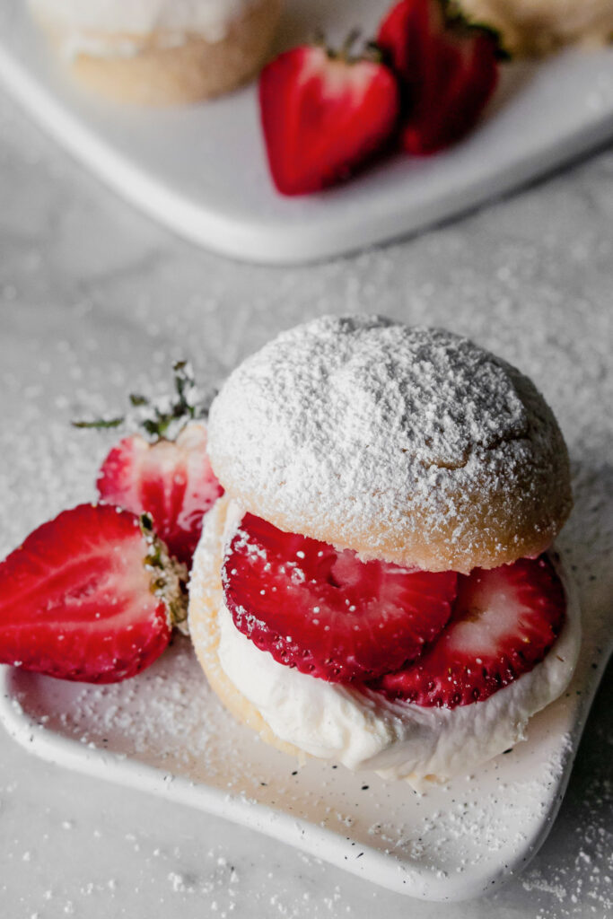 homemade strawberry shortcake dusted with powdered sugar