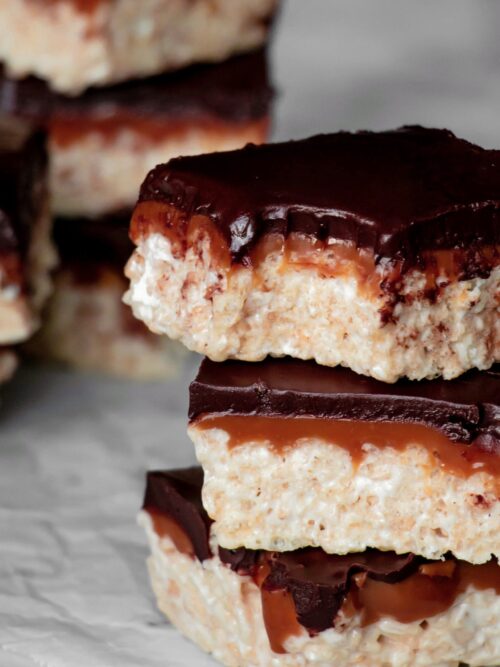 Homemade Rice Krispie Treats with chocolate and caramel stacked