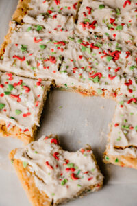 homemade frosted sugar cookie bars with a bite