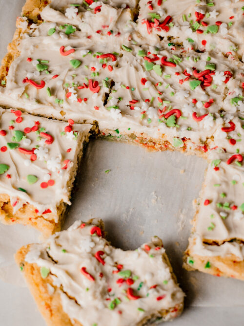 homemade frosted sugar cookie bars with a bite