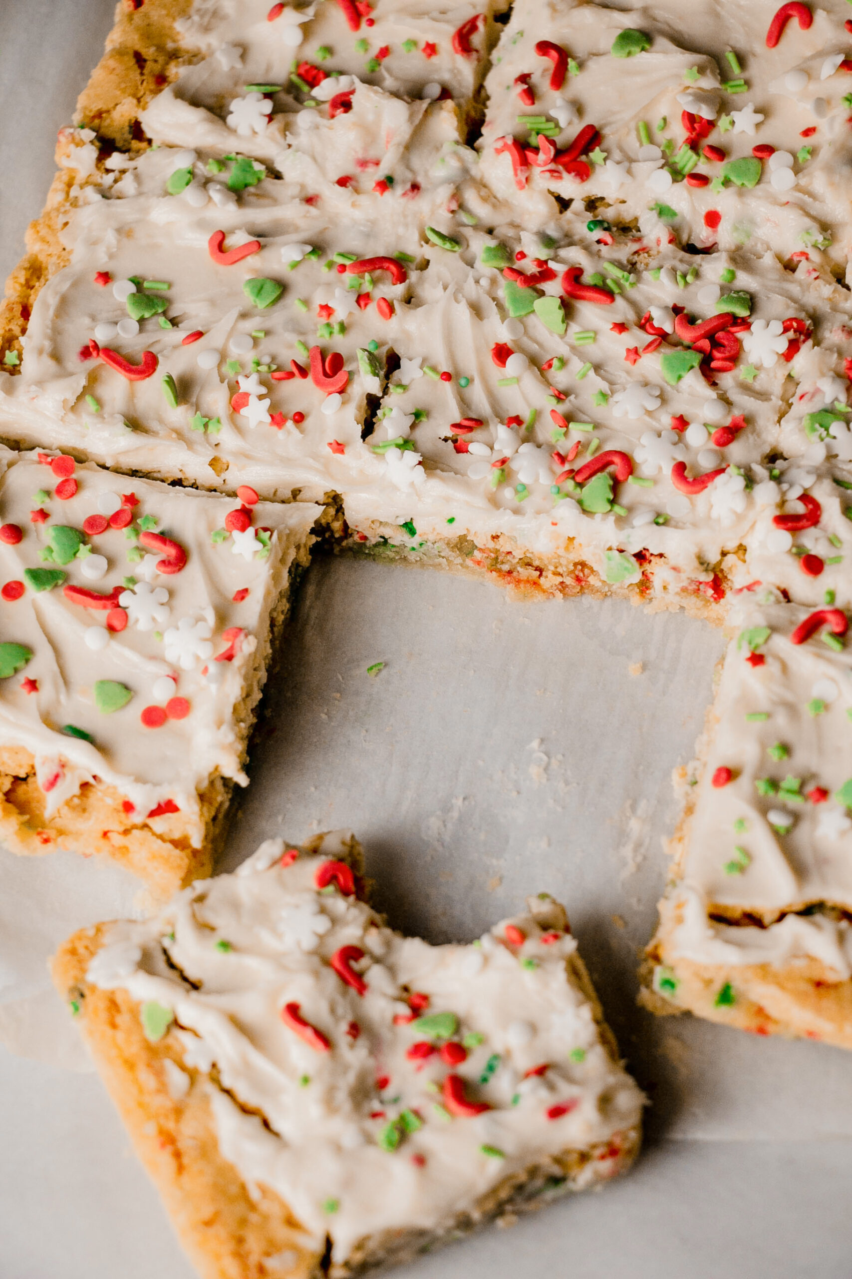 homemade frosted sugar cookie bars with a bite